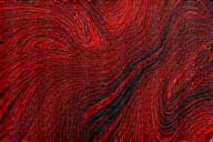 Red and black woodgrain ebonite swatch